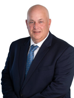 A photo of Kent Dollar, MLA for District 15: Brackley-Hunter River