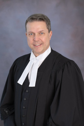 A formal photo of Hon. Brad Trivers, Speaker of the Legislative Assembly of Prince Edward Island.
