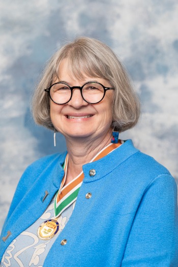 A photo of Dr. Laure Brinklow, 2025 Order of PEI recipient, wearing the Medal of Merit.