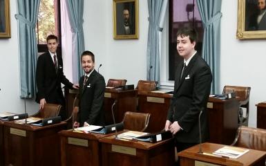 An image of student pages preparing the chamber for business