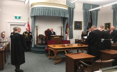 An image of people in the legislative chamber