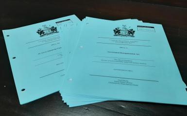 An image of blue papers used for printing bills
