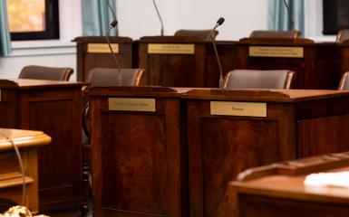 An image of desks in the legislature
